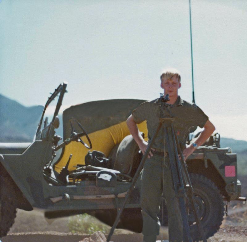 U.S. Army Specialist 5 Randy Donckers surveying bombs dropped by F-15 jets